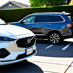 **

"A modern hybrid car is parked in a suburban driveway next to a gas-guzzling SUV, illustrating the fuel efficiency contrast. The hybrid is sleek and well-maintained. Sunlight reflects on the vehicles, creating a sense of eco-friendliness versus traditional fuel consumption. In the background, a charging station is visible, hinting at the shift towards electric vehicles. fully clothed, appropriate content, safe for work, perfect anatomy, natural proportions, family-friendly."

**